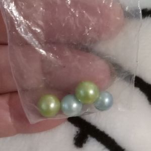 Akoya loose pearls blueish green